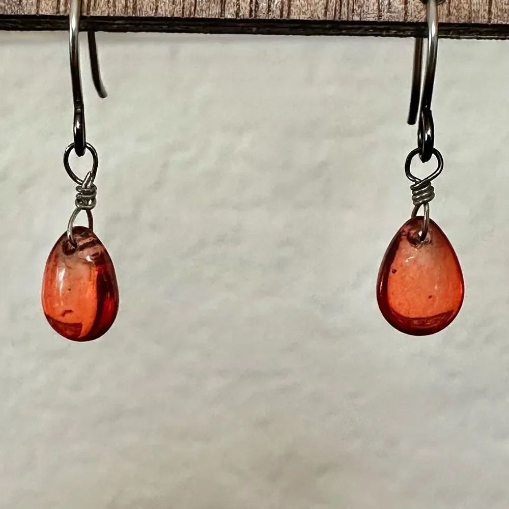 Silver tone orange teardrop dainty earrings